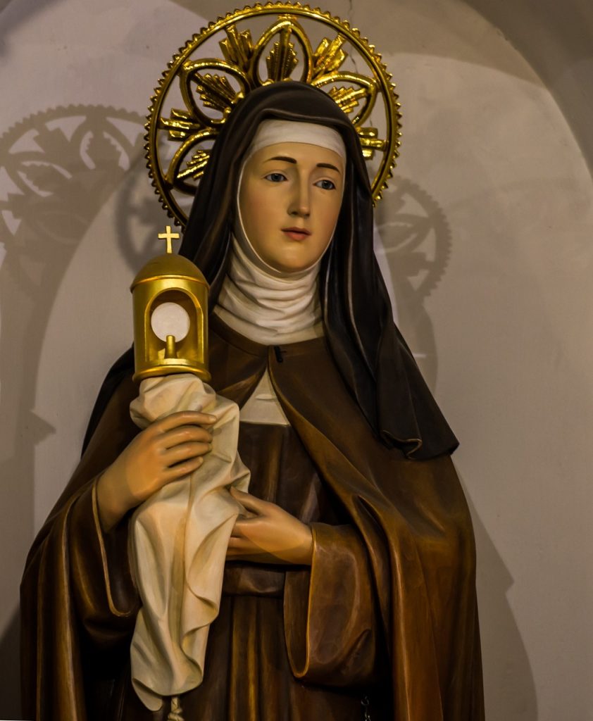 saint Claire of Assisi, catholic saint, Eucharist